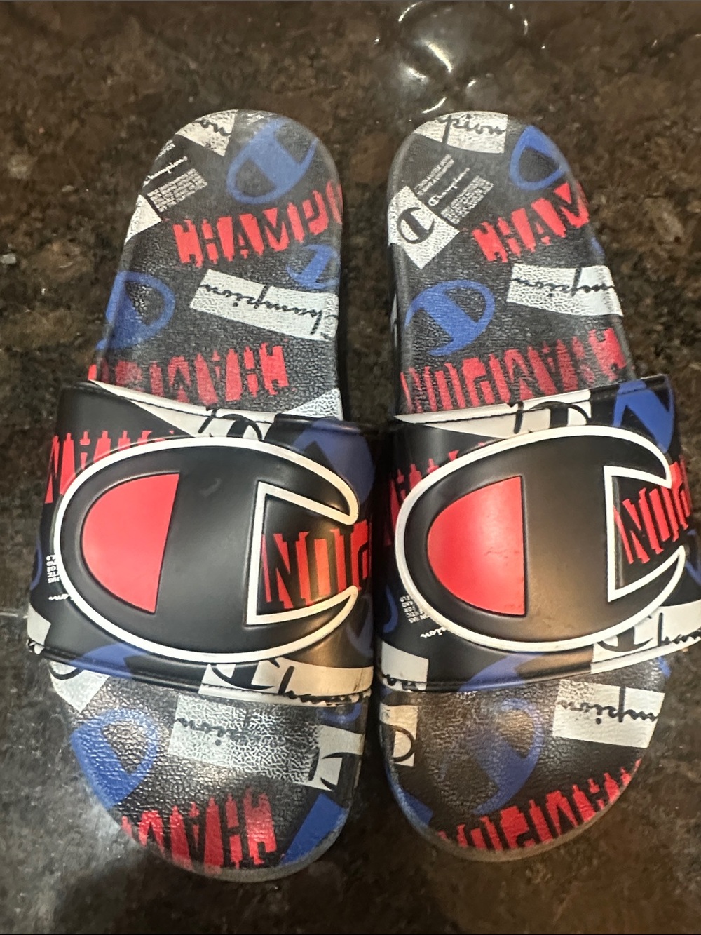 Champion Kids Black Slide Sandals with Red & Blue Logo Accents